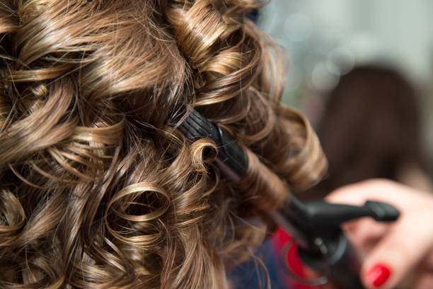 istock Women's hair in salon 865432648