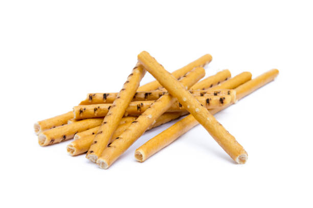 istock Salty cracker pretzel sticks isolated on white background 865440012