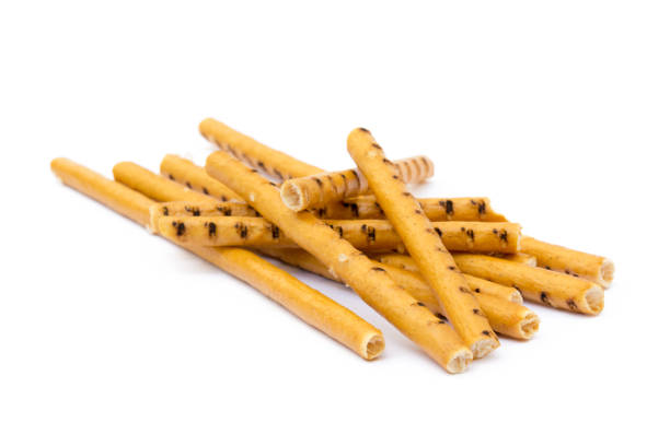 istock Salty cracker pretzel sticks isolated on white background 865440028
