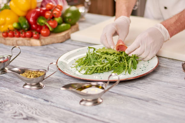 istock Chef cooking delicatessen salad at restaurant. 865440134