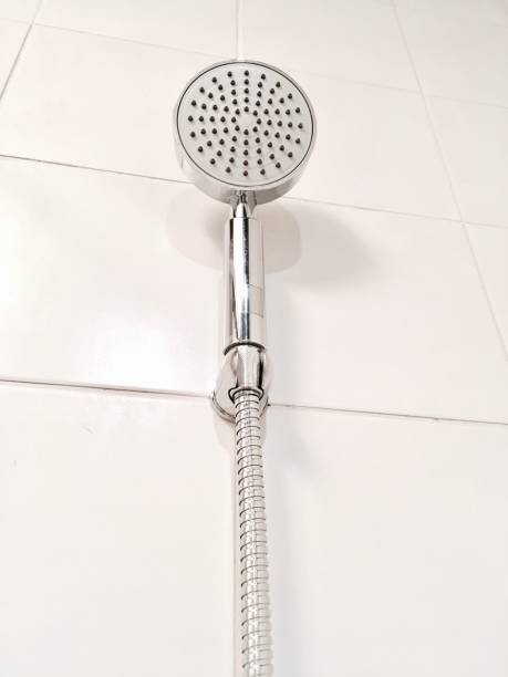istock Silver Shower Head in A Modern Bathroom 865442794