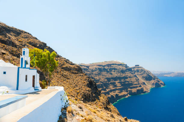 istock White church on the coast, Santorini island, Greece 865443572