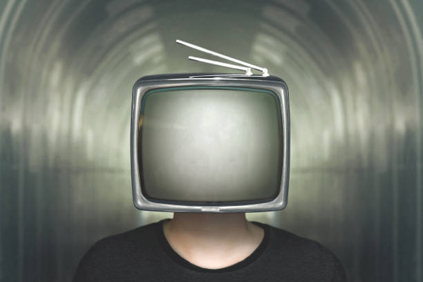 istock man with tv on his head surreal television control concept 865443888