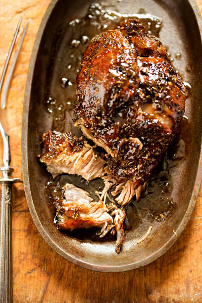 Slow cooked lamb shoulder with honey & balsamic glaze stock photo