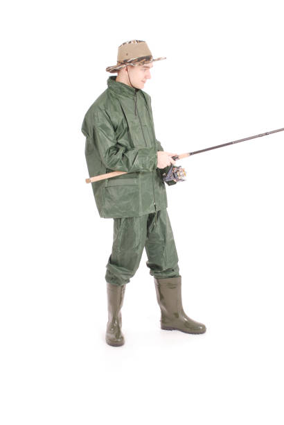 istock Fisherman holding a fishing pole 865451472