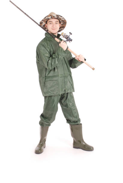 istock Fisherman holding a fishing pole 865451796