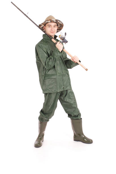 istock Fisherman holding a fishing pole 865451846
