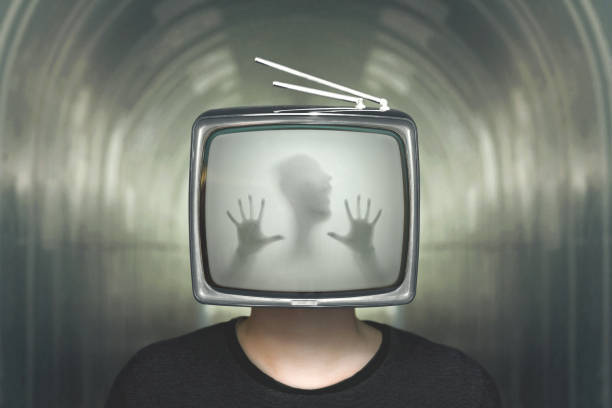 istock desperate man trapped in a television surreal concept 865452904