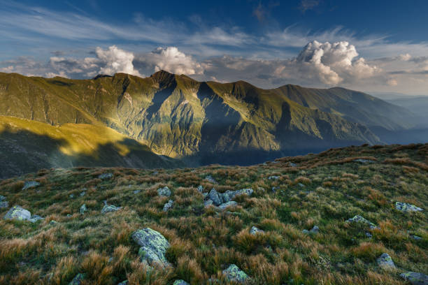 istock Alpine landscape in a cloudy day 865460062