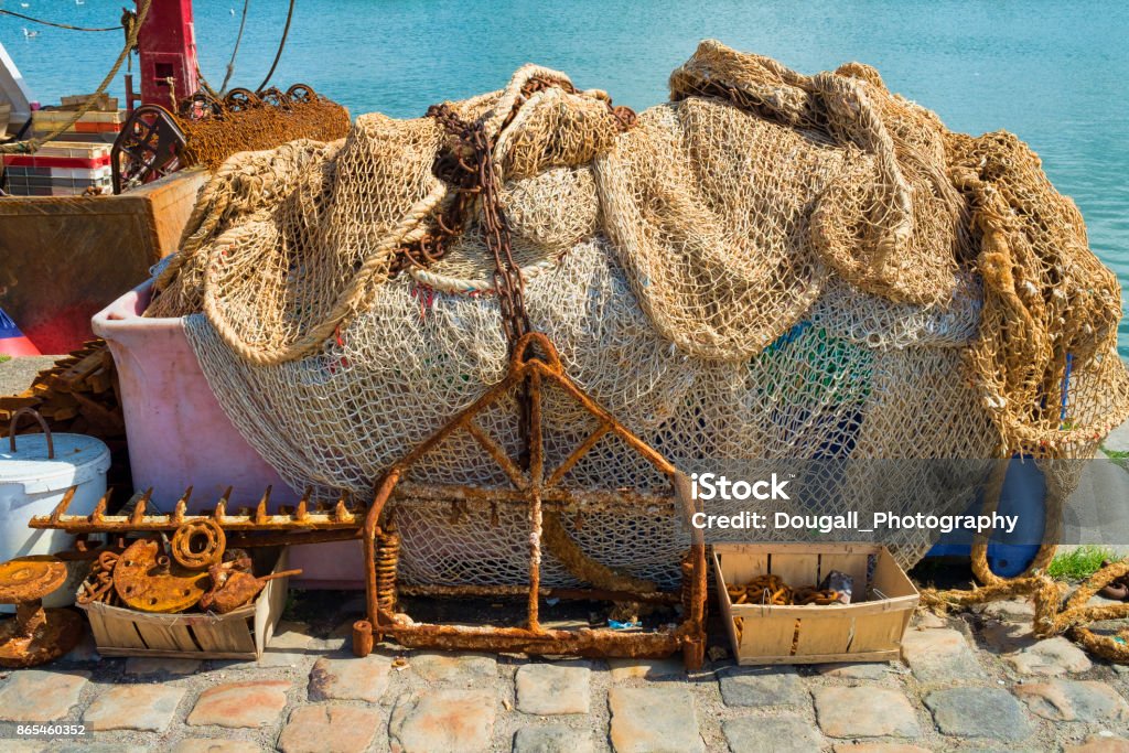 Fishermans Nets And Equipment Used For Commercial Fishing Stock Photo -  Download Image Now - iStock