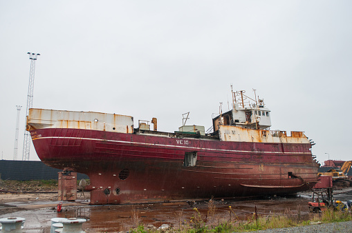 old trawler being scrapped in Esbjerg Port in Denmark