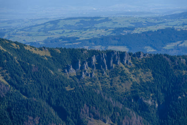 Tatra mountain peak view in Slovakia in sunny day. blue perspective on multi layer hills