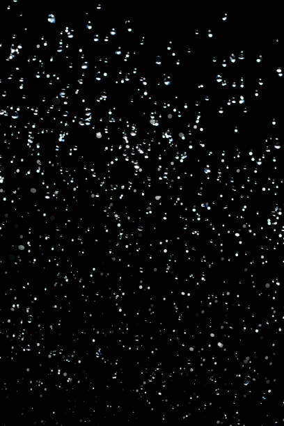 istock Drops of rain on a black background 865471224