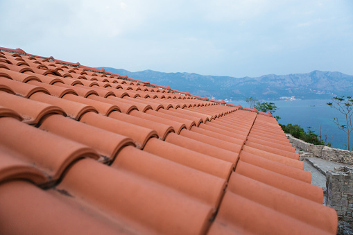 New red roof tiles on the gabled roof