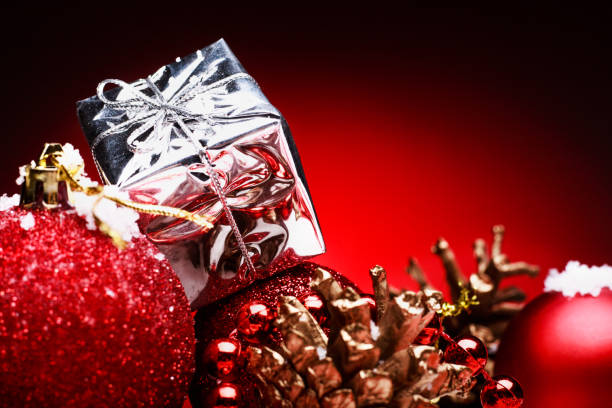 istock Christmas composition of Christmas tree toys on a red background 865477770
