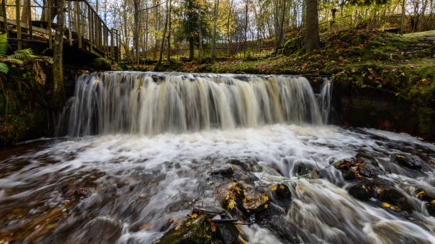istock Waterfall from ravine in autumn, long exposure 865477810