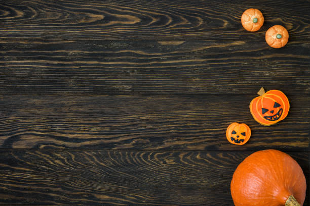 istock Halloween background with pumpkin and cookies 865482706