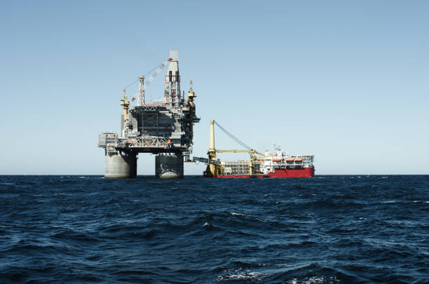 istock Oil rig and support vessel on offshore area 865489504
