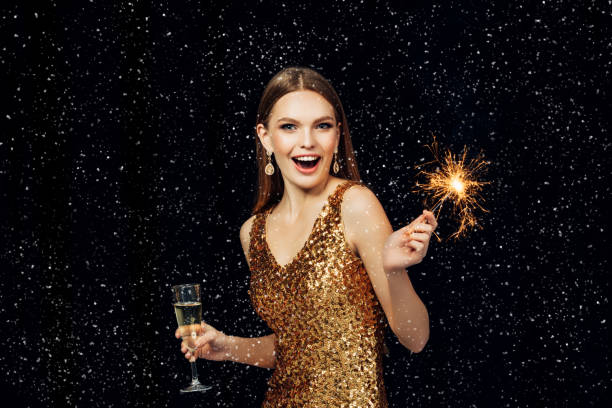 istock Smiling girl with Christmas sparkler 865496532