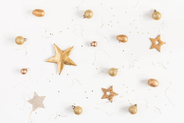 istock Christmas golden decorations on white background. Flat lay, top view 865496764