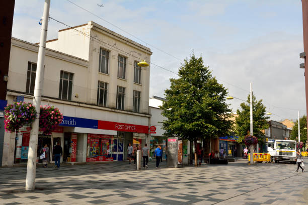 View of High Street in Slough Slough, United Kingdom - September 7, 2017. View of High Street in Slough, with historic buildings, commercial properties. thames valley stock pictures, royalty-free photos & images