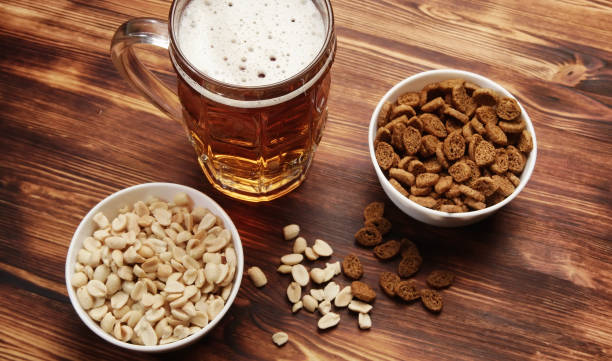 istock Beer in a mug and snack 865513254