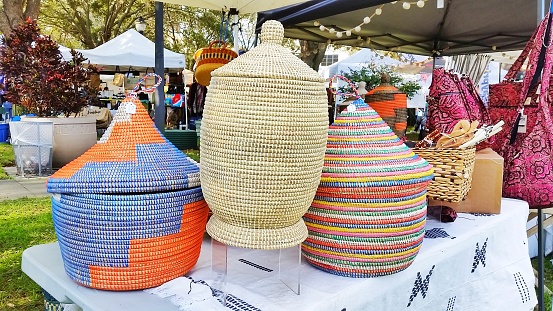 Handmade colorful baskets and goods for sale at Festival market St petersburg,  Florida.