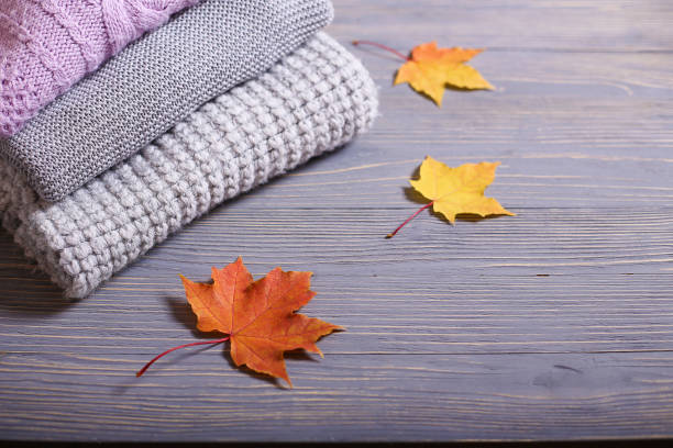 istock Autumn accessories knitted sweaters and leaves 865527680