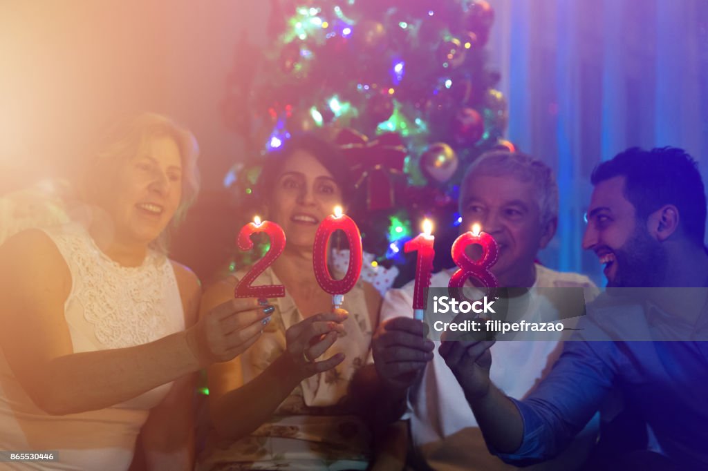 Family on the living room celebrating the New Year 2018 People collection 2018 Stock Photo
