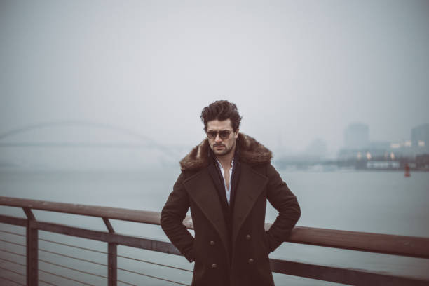 istock Gentleman standing by the lake 865534224