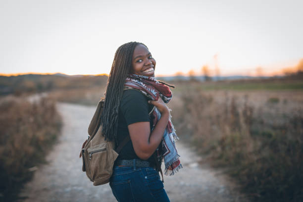 istock Cute african woman hiking 865534310