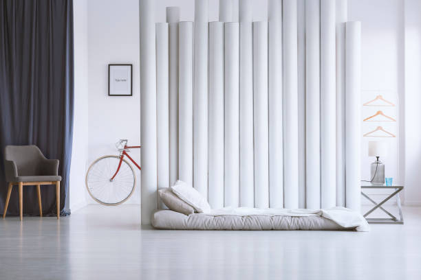 istock Gray and white bedroom 865541558