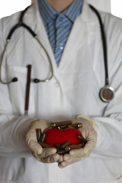 istock heart and sleeve in doctor hand 865545248