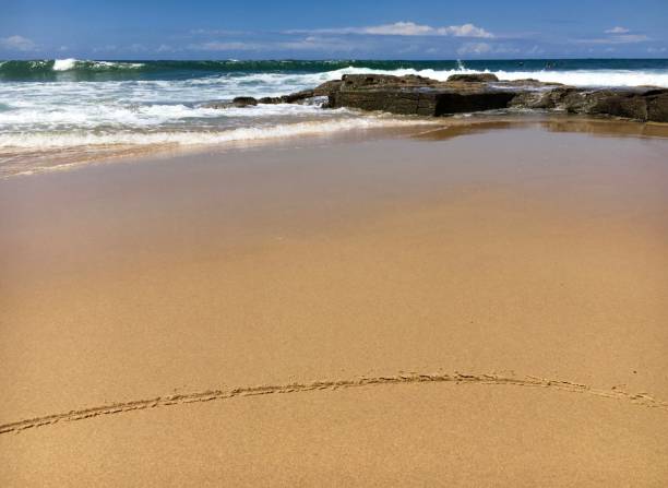 istock Draw a Line in the Sand at the Beach 865545402