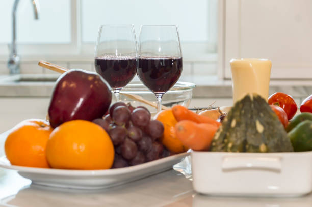 istock Fresh fruit, vegetable and red wine glass on the table 865545636