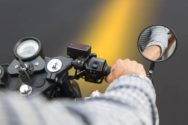 istock Driver riding motorcycle on an asphalt road. 865552616