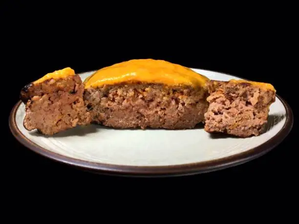 Third pound rare steak burger draped with super-sharp American cheddar cheese.