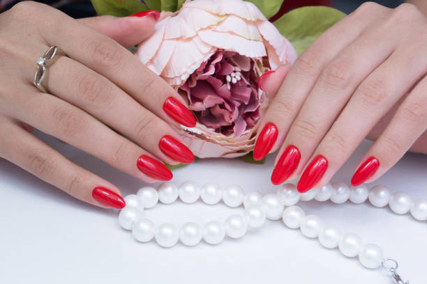 istock Natural nails with gel polish applied. Ideal manicure and women's hands. 865563230