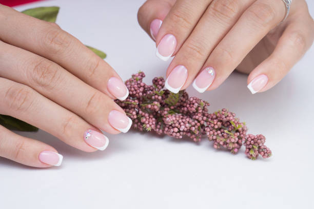 istock Natural nails with gel polish applied. Ideal manicure and women's hands. 865566140