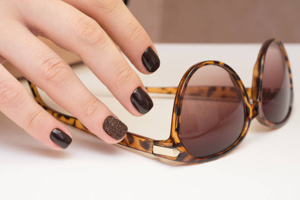 istock Natural nails with gel polish applied. Ideal manicure and women's hands. 865566910