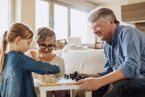 istock Grandparents and granddaughter spending time 865570230