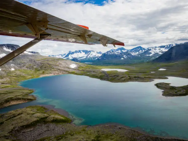 Aerial view of Katmai National Park wilderness from sea plane with lakes and snow capped mountains