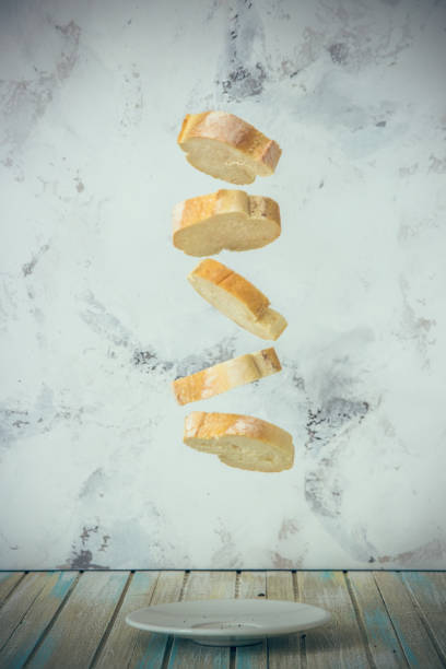 Flying baguette. Bread sliced. Levitation concept