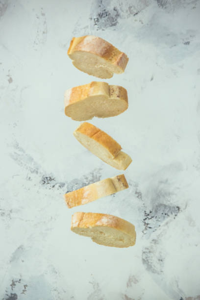 Flying baguette. Bread sliced. Levitation concept
