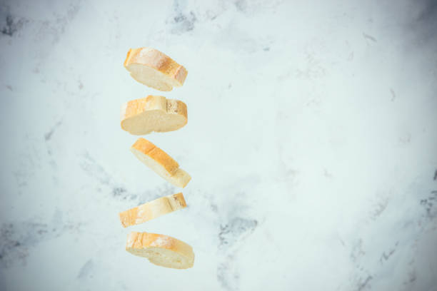 Flying baguette. Bread sliced. Levitation concept