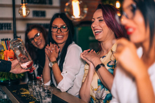 istock Friends enjoying a party at the bar 865576972