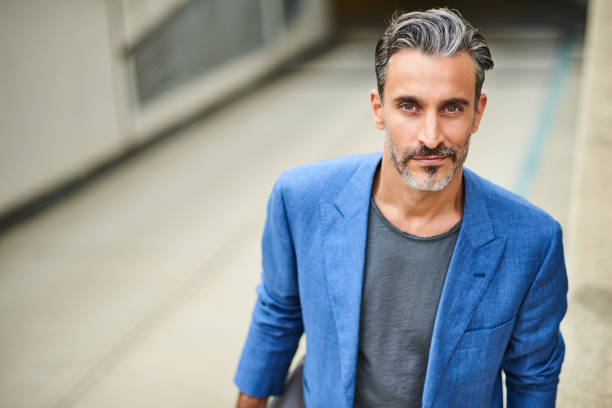 istock Elegant mature man looking at camera 865586502