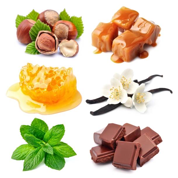 Set of sweet ingredients. Sweet spice closeup on white backgrounds. Set of sweet ingredients. (Chocolate, honey, caramel, mint, vanilla, nuts.) caramel photos stock pictures, royalty-free photos & images