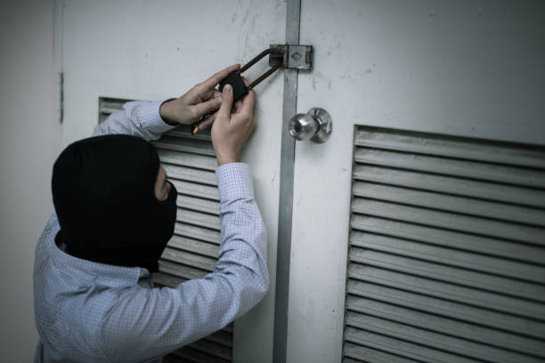 istock robber in black mask. robbery and crime concept. 865603832