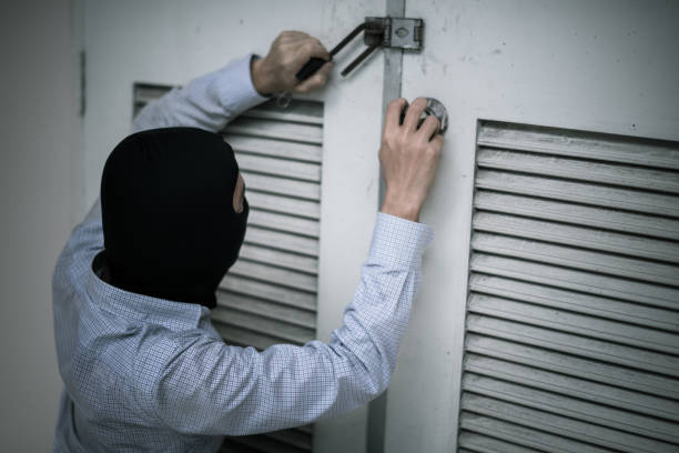 istock robber in black mask. robbery and crime concept. 865603918